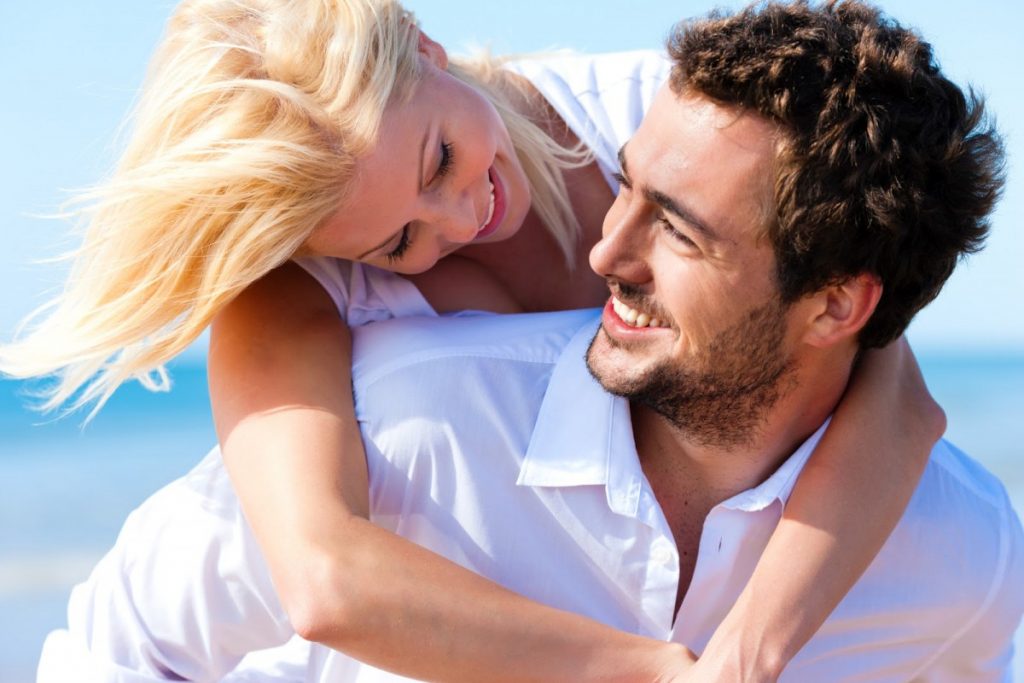 couple dating at the beach