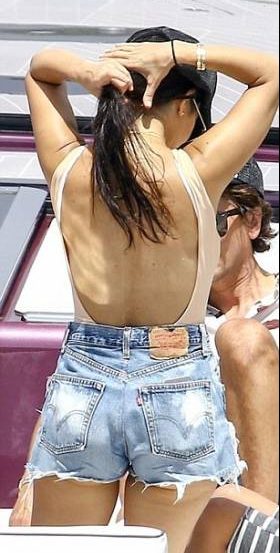 Sizzling #KourtneyKardashian back less top with jean cut-offs