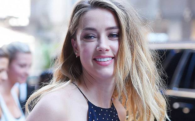 Amber Heard Arrives for Deposition