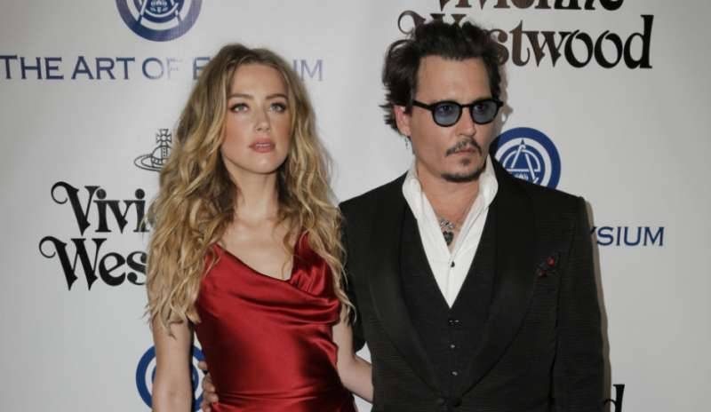 Amber Heard, Johnny Depp reach divorce settlement