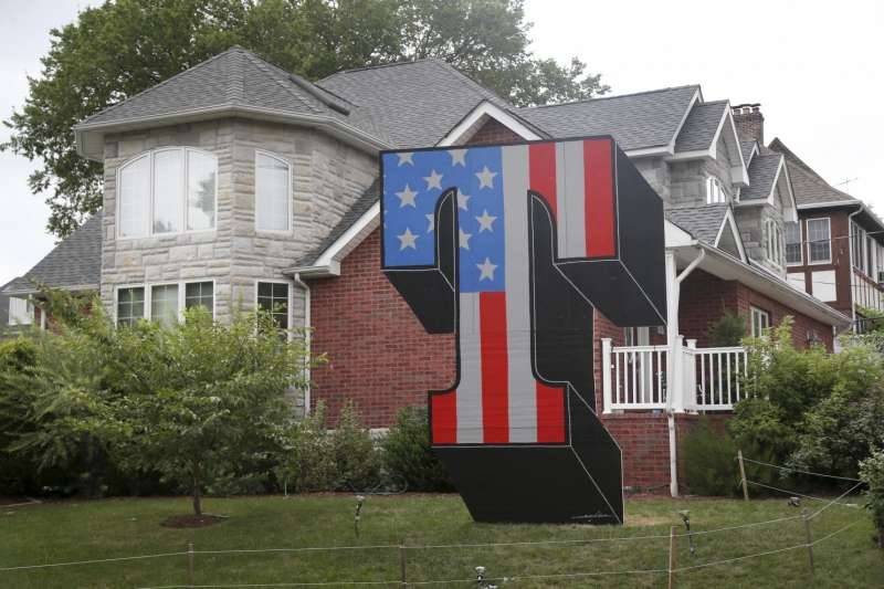 Giant T (for Trump) replaces one that was torched on lawn