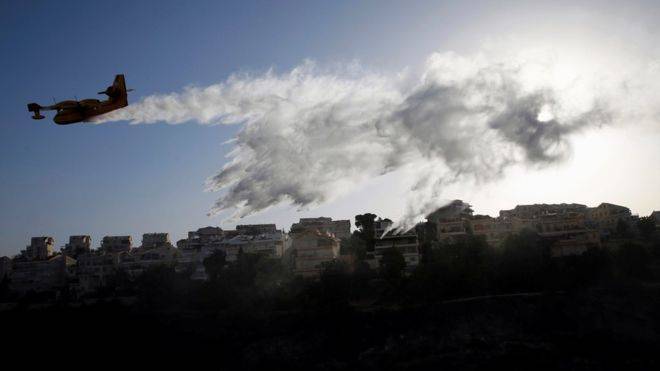 Israel fires: Dozen suspects arrested on suspicion of arson