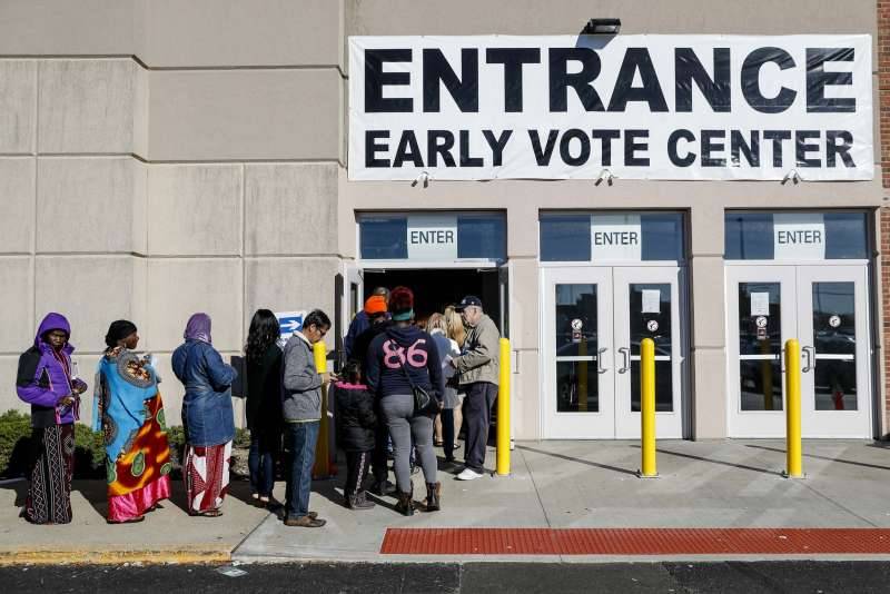 Record early voting turnout may give edge to Hillary Clinton