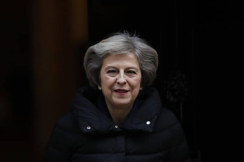 Britain to leave EU market as May sets hard Brexit course