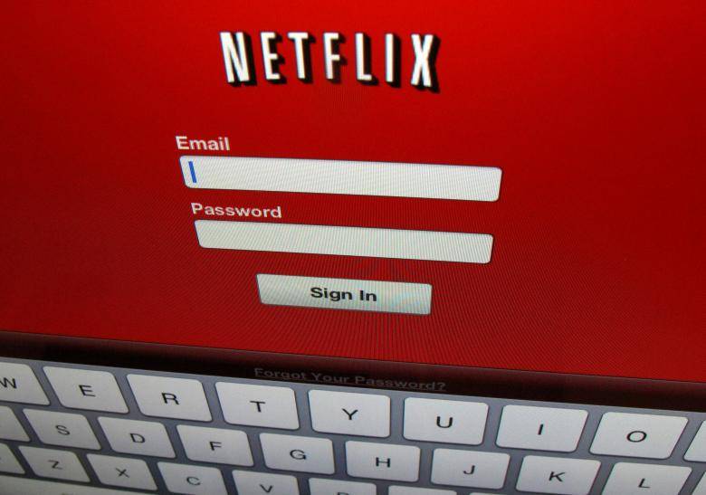 Netflix adds a third more subscribers than expected shares jump eight percent