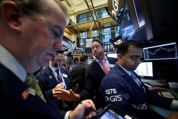 Wall Street slips after soft GDP data, earnings