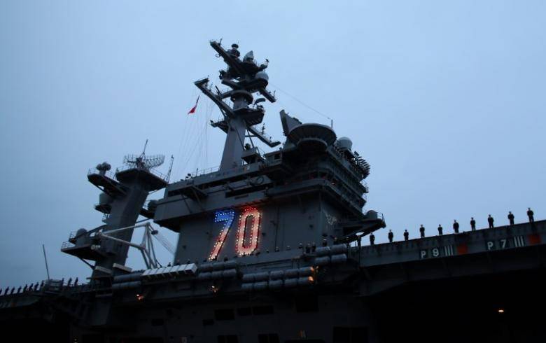 China military says aware of U.S. carrier in South China Sea