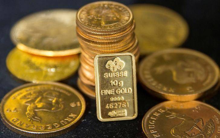 Gold Slips As Dollar Strengthens Against Yen Post Trump Abe Meet