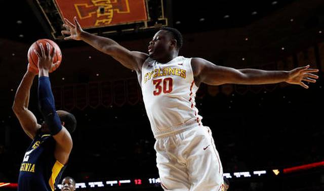 No. 7 West Virginia overwhelms Iowa State 85-72 on the road