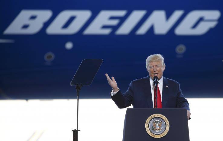 Trump pledges to protect U.S. jobs during visit to Boeing plant