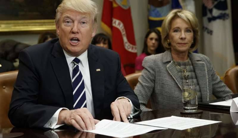 Trump praises DeVos, pledges to expand school choice