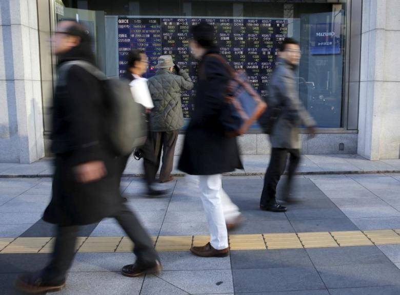 Asian stocks slip, Fed’s decision day makes investors wary