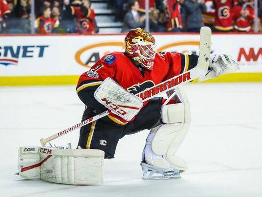 Flames beat Penguins in SO to tie franchise record with 10th straight win