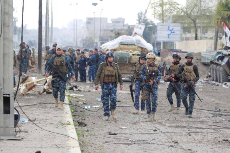 Iraqi forces battle toward landmark Mosul mosque