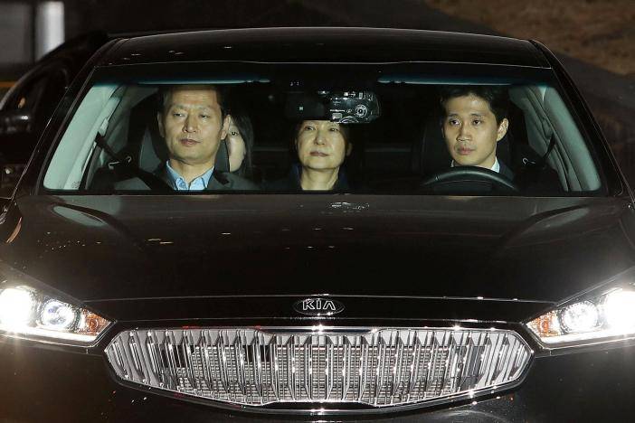 Ousted South Korean leader behind bars after arrest on bribery charges