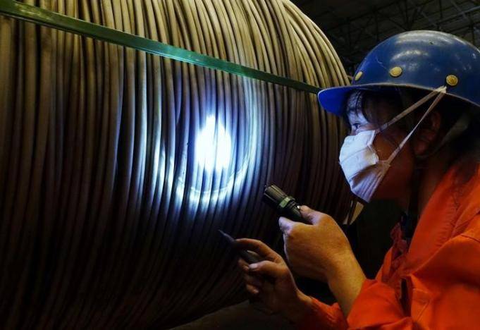 China March producer inflation cools for first time in seven months on steel glut fears