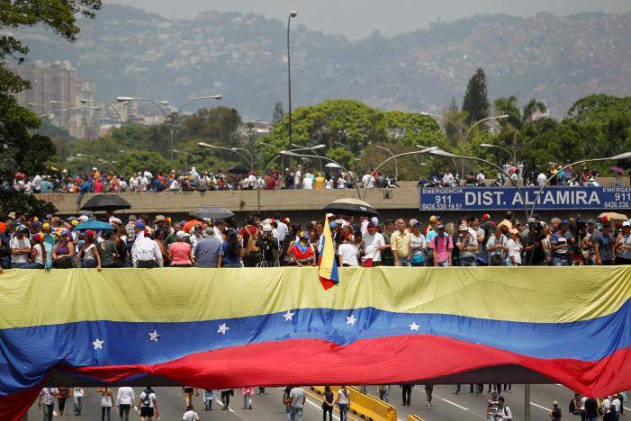 Death toll in Venezuela’s unrest rises to 26