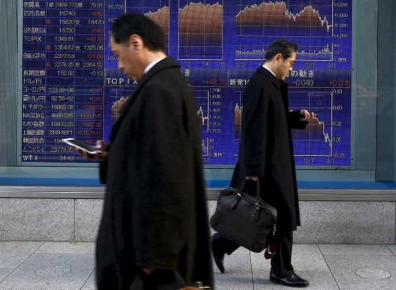 Asia stocks pressured as Wall St. hit by healthcare vote delay