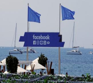 The Logo Of The Social Network Facebook Is Seen On A Beach During The Cannes Lions In Cannes