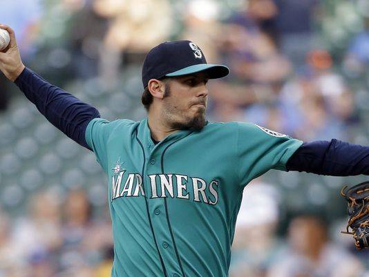 Mariners use long ball to slug their way past Rays, 12-4