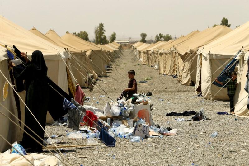 The Families And Relatives Of Men Accused Of Being Islamic State Militants Are Seen At A Camp In Bartella