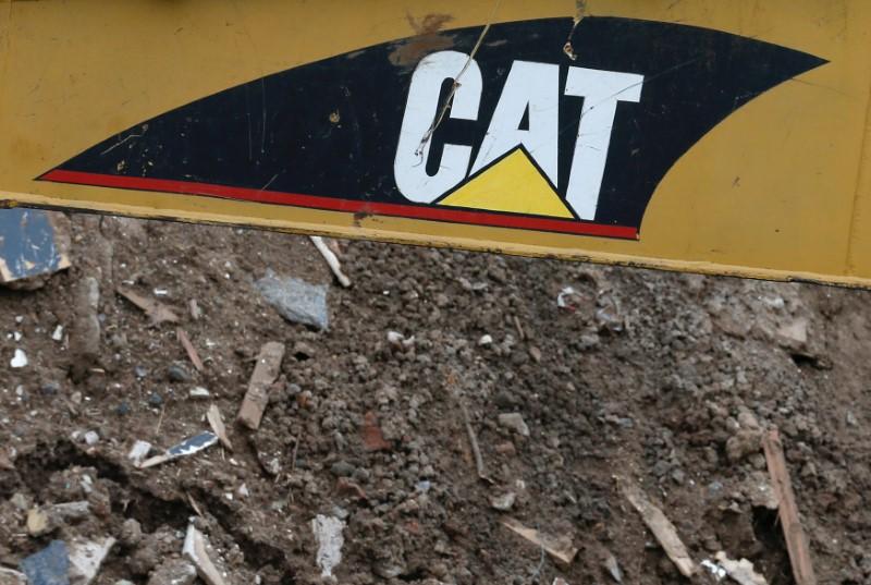 Caterpillar bulldozes expectations, raises 2017 forecast again