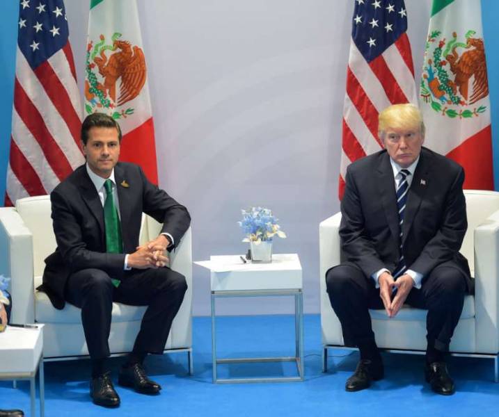 Donald Trump says Mexico will pay for border wall after meeting with President Peña Nieto