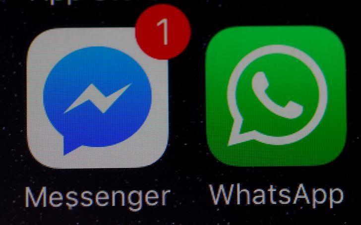 WhatsApp And Facebook Messenger Icons Are Seen On An IPhone In Manchester , Britain.