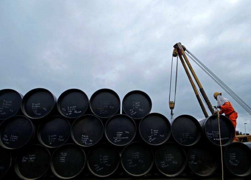 Oil hits two-month high on tighter U.S. market, Venezuela sanctions risk