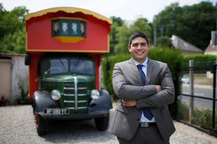 Rookie French lawmaker reaches out from fortune-teller’s van