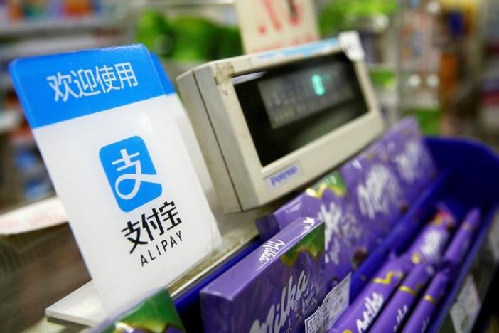 An Alipay Logo Is Seen At A Cashier In Shanghai January 12, 2017. REUTERS/Ali Song