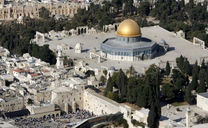 Three Israelis wounded in shooting near Jerusalem holy site, gunmen dead