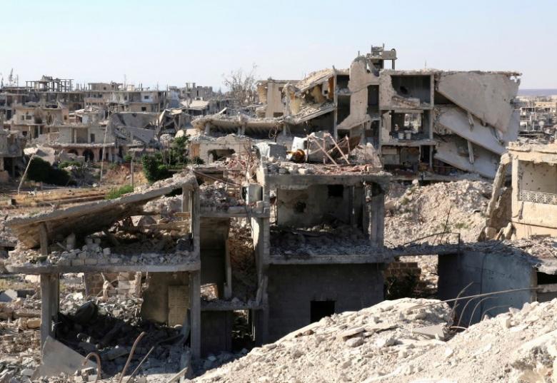 FILE PHOTO: A General View Shows Damaged Buildings In A Rebel Held Part Of The Southern City Of Deraa