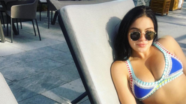 Ariel Winter Lounges Poolside With BF Levi Meaden & Looks Better Than Ever In Blue Bikini