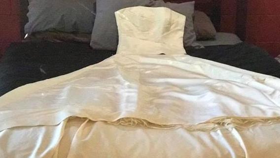 Darwin man posts ‘ex-wife’s wedding dress’ for sale to buy fishing rod and beer