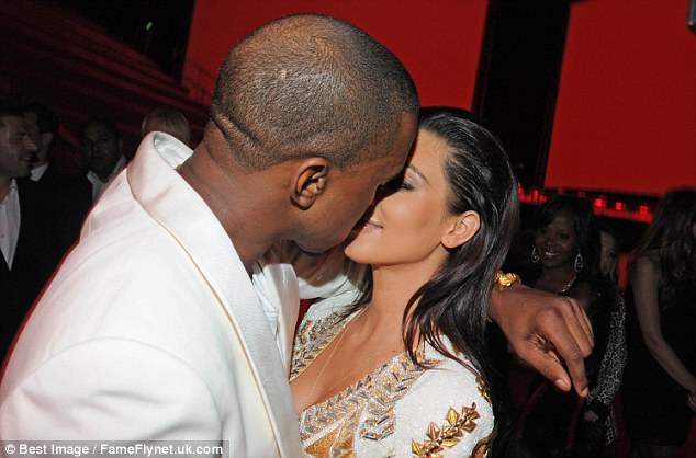 Kim Kardashian Kisses Kanye West While Cozying Up For Fight Night After Taylor Swift Drops Diss Track