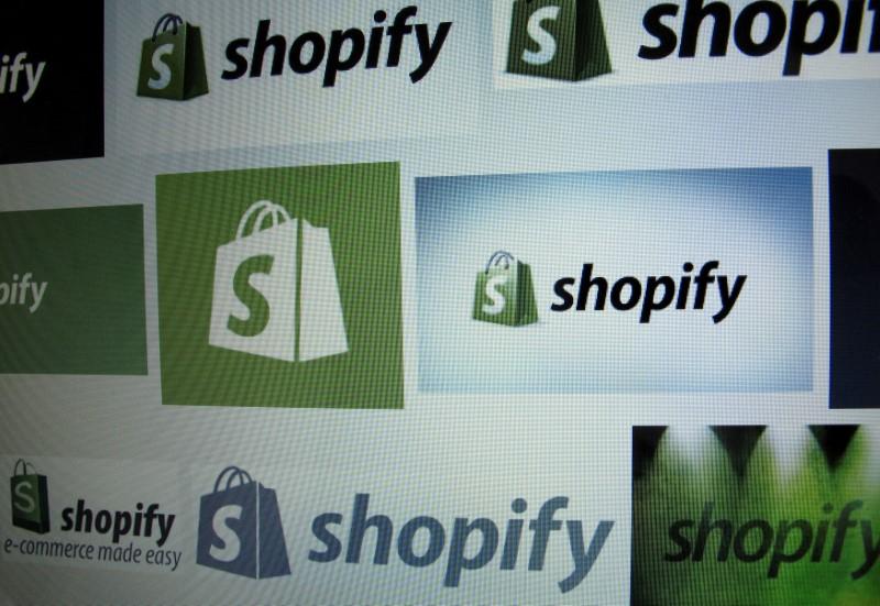 Shopify signs up more big brands, shares rise to record