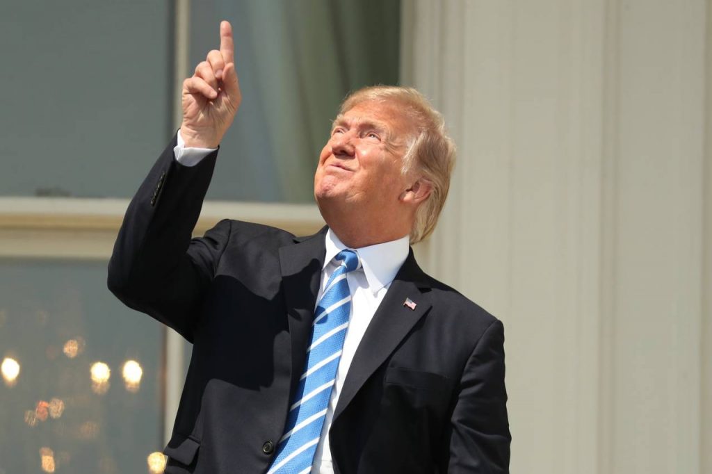 Trump celebrates solar eclipse by looking up without special viewing glasses