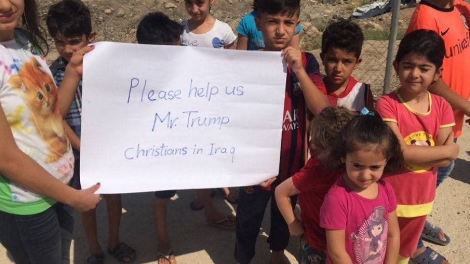 Photos of religious minority children pleading for Trump’s help show urgency for Iraq aid