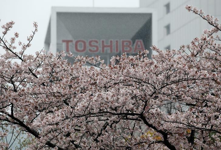 Toshiba $18 billion sale of chip unit signed, but discord emerges immediately Toshiba $18 billion sale of chip unit signed, but discord emerges immediately: Japan’s Toshiba Corp said on Thursday it had signed an $18 billion deal to sell its chip unit to a consortium led by Bain Capital LP, overcoming a key - albeit not its last - hurdle as it scrambles for funds to stave off a potential delisting. But in an inauspicious sign, a Tokyo news conference on the deal was canceled, with Bain saying the consortium could not form a consensus on whether to brief media - underscoring fears that the 8-member group contained too many competing interests for it to work well. The sale of the unit - the world’s second biggest producer of NAND chips - was agreed last week after a tortuous auction process but the signing was delayed because consortium member Apple Inc demanded new terms on chip supply, sources familiar with the matter have said. “This consortium has so many members that it is going to be hard to come to consensus and agree on who’s going to take the initiative,” said Hideki Yasuda at Ace Research Institute, but he added that if the sale was successfully completed it would reduce a lot of risks for Toshiba. Although the news conference was canceled just minutes before it was due to begin, the head of Bain Capital in Japan, Yuji Sugimoto, said the disagreements over the briefing had no bearing on the contract. He did not disclose which members had objected to the news conference. The deal - which must also overcome legal challenges - will see Toshiba reinvest in the unit and together with Hoya Corp, a maker of parts for chip devices, Japanese firms will hold more than 50 percent of the business - a keen wish of the Japanese government. A Japanese state-backed fund and bank have also expressed their interest in investing in the future subject to certain conditions, Toshiba said in a statement. CRITICAL NAND Pressure from the Japanese government, changing alliances among suitors and a slew of revised bids has drawn out the auction over nine months - heightening the risk that the deal may not close before the end of Japan’s financial year in March as regulatory reviews usually take at least six months. If the deal does not close before then, Toshiba - hurt by liabilities at is now bankrupt nuclear unit Westinghouse - is likely to end a second consecutive year in negative net worth, putting pressure on the Tokyo Stock Exchange to strip it of its listing status. The sale also faces legal challenges from Western Digital, Toshiba’s chip venture partner and rejected suitor, which is seeking an injunction to block any deal that does not have its consent. Western Digital, one of world’s leading makers of hard disk drives, paid some $16 billion last year to acquire SanDisk, Toshiba’s chip joint venture partner since 2000. It sees chips as a key pillar of growth and is desperate to keep the business out of the hands of rival chipmakers. The acrimonious squabbling over Toshiba’s chip unit also highlights the critical importance of NAND memory chips, as data storage is key to most next-generation technologies from artificial intelligence and autonomous driving to the Internet of Things. In addition to Apple, Bain’s consortium includes South Korean chipmaker SK Hynix, as well as Dell Inc [DI.UL], Seagate Technology Plc and Kingston Technology - all of which want access to NAND technology. Seagate said in statement that with its participation, it expects to enter into a long-term supply agreement that ensures sufficient raw NAND for its solid state drives or SSDs, which are faster and lighter than hard disk drives. Under the deal, Toshiba will have 40.2 percent of voting rights in the chip unit and Hoya will own 9.9 percent. The four U.S. tech firms will not have voting rights. In a move to address anti-trust concerns that may come up in a regulatory review, Toshiba said SK Hynix would be firewalled from accessing proprietary information that belonged to the chip unit and for 10 years, would not be permitted to own more than 15 percent of voting rights. Source: http://www.reuters.com/article/us-toshiba-accounting/toshiba-18-billion-sale-of-chip-unit-signed-but-discord-emerges-immediately-idUSKCN1C30P1