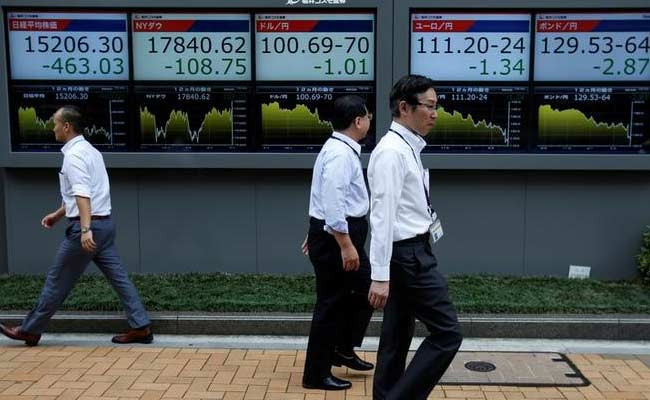 Asian shares gain after upbeat earnings from U.S. tech titans