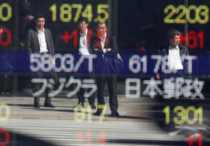 Asian shares hover near recent highs NZ dollar slips