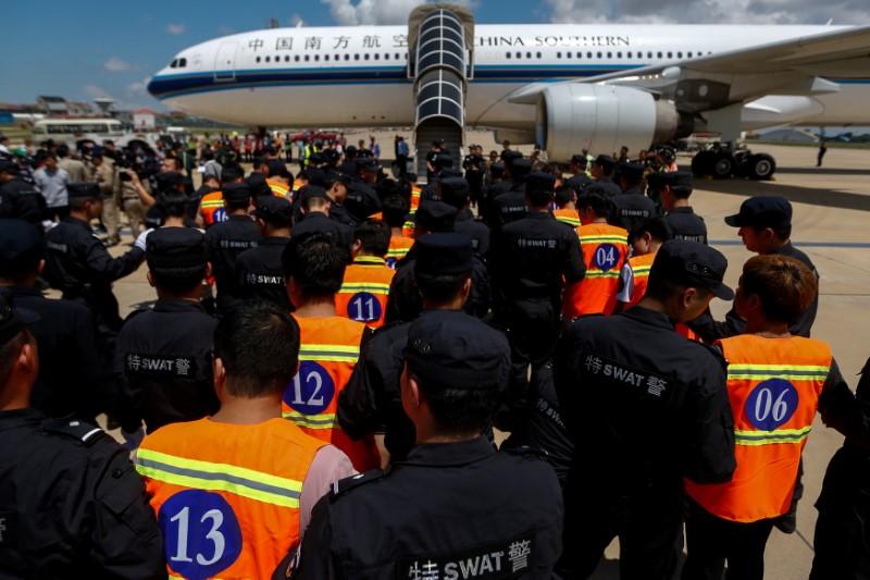 Cambodia deports 61 Chinese telecom extortion scam suspects