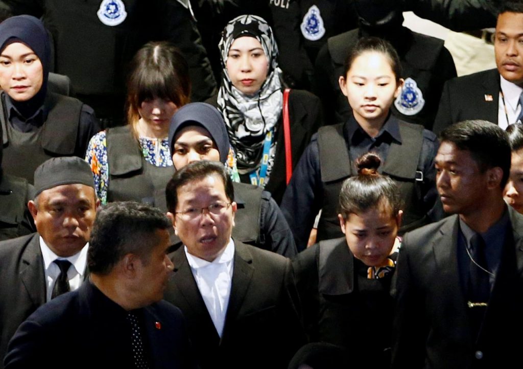 Chaotic scenes as suspects wheeled around airport where North Korean leader's brother killed