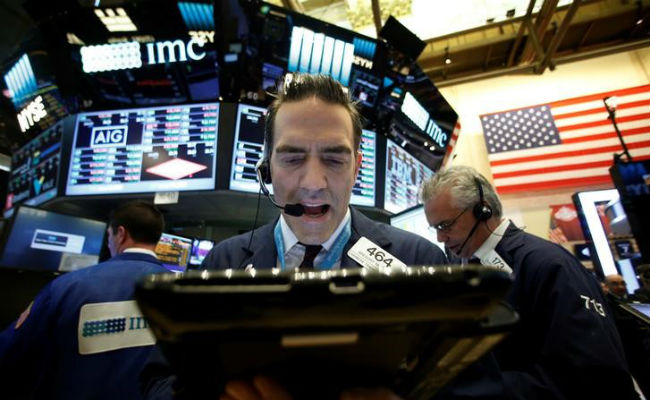 Dow pierces 23,000 but ends below milestone