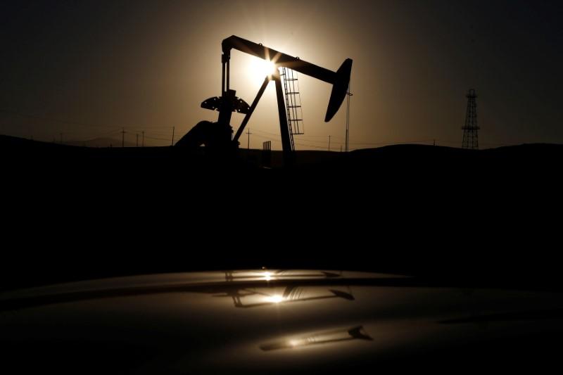 Oil prices settle up on demand forecasts Kurdistan tensions