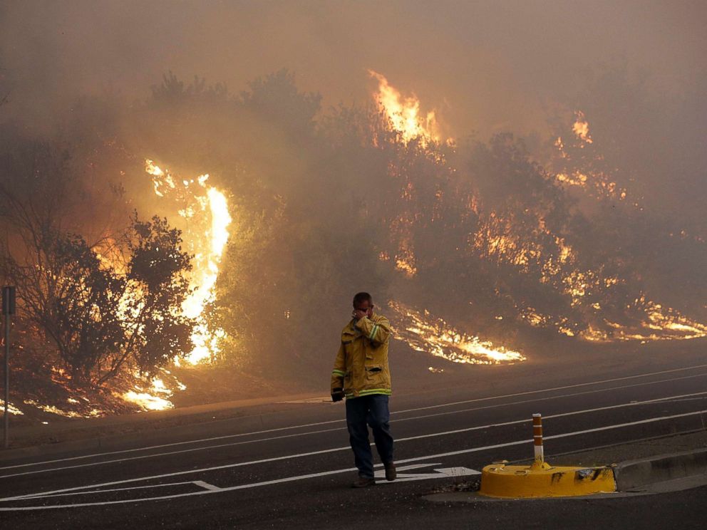 Thousands flee as wildfires ravage California, at least 17 killed