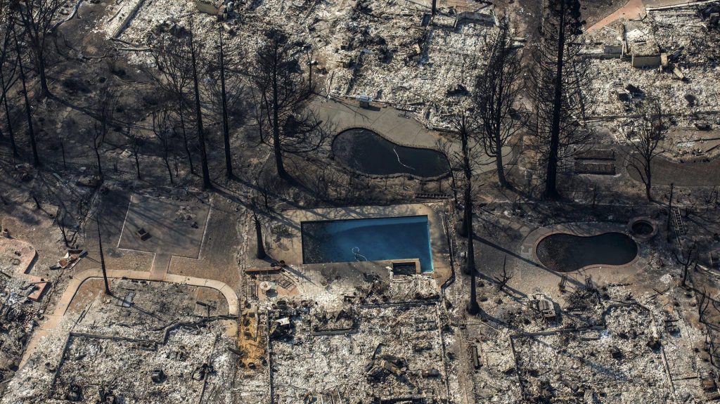 Whole towns evacuated as Northern California firestorm grows, at least 23 people are dead