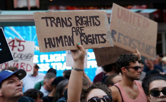 In defeat for Trump, judge blocks transgender military ban