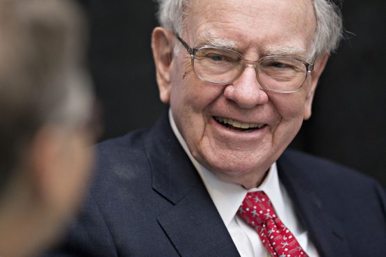 Buffetts Berkshire slashes IBM stake adds to Apple